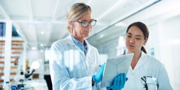 Laboratory professionals reviewing data.